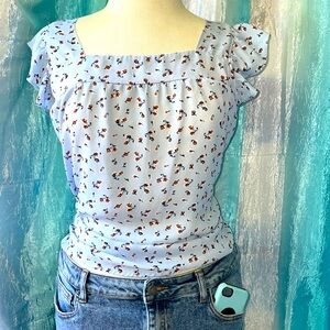 Brown flowers and baby blue blouses